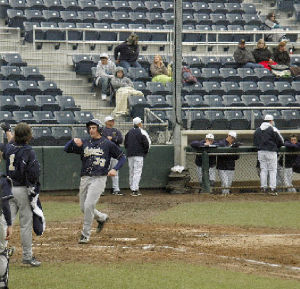 As junior first baseman Jon Van Eyk walks in toward home plate from his three-run homer