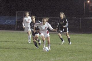 Tomahawk senior Leslie James chases a loose ball in Snohomish territory late in the first half.