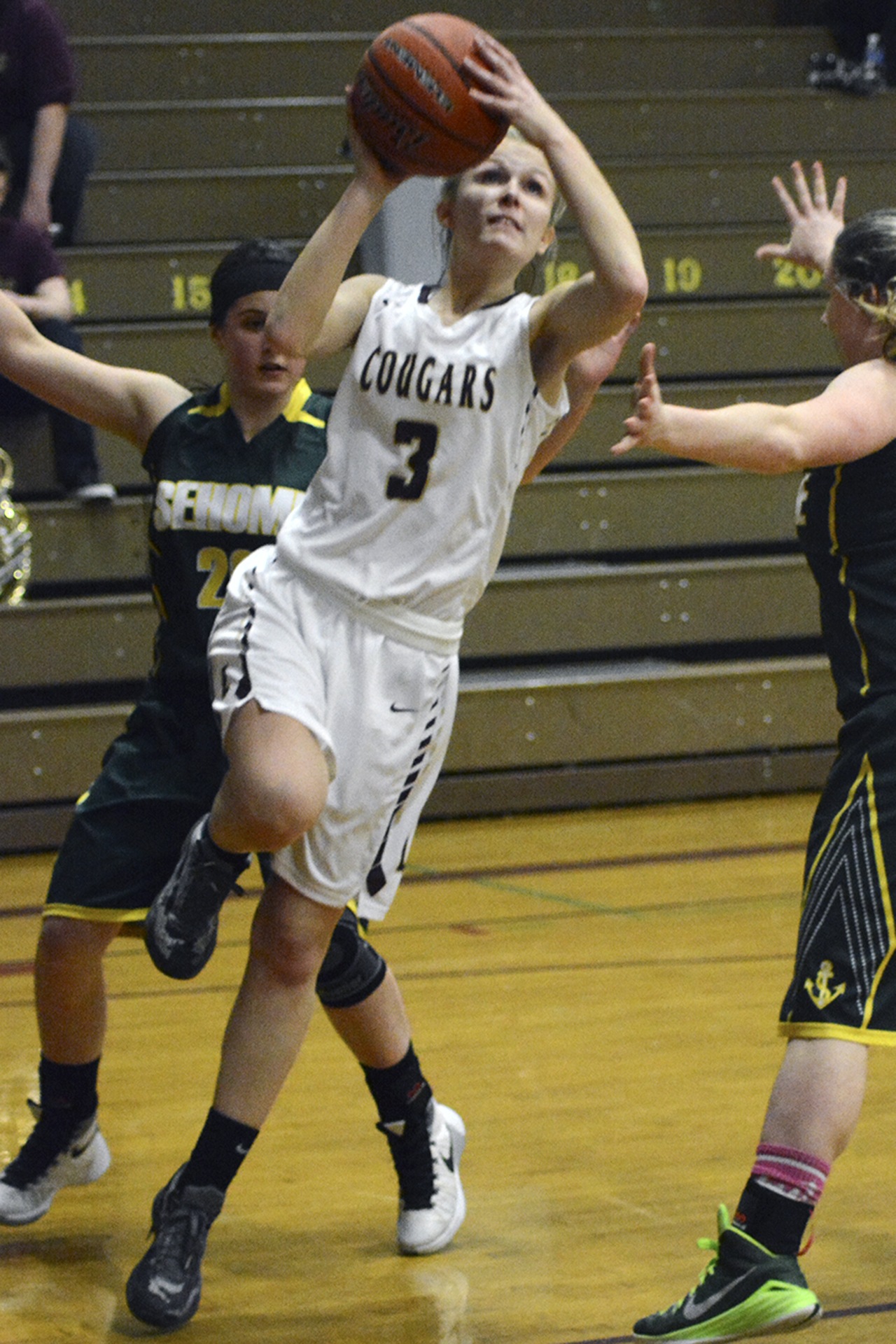 Emily Senyitko of Lakewood goes for a layup. Brandon Adam/Staff Photo