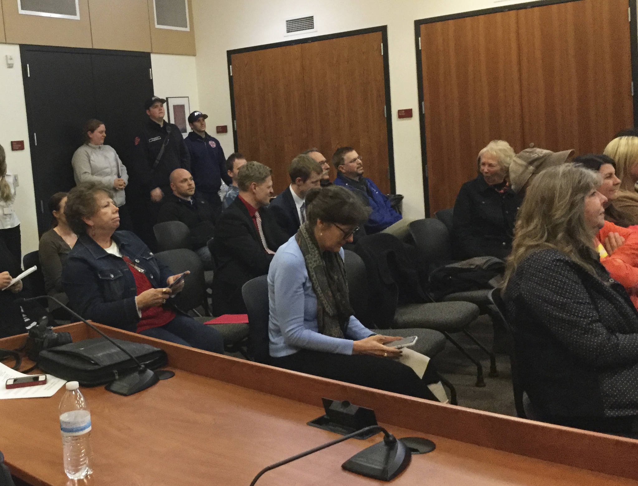 Onlookers attending a live video feed of the announcing of winners in the America&rsquo;s Best Communities Grand Prize Ceremony in Denver react to news that Arlington-Darrington was not among the top three prize winners.