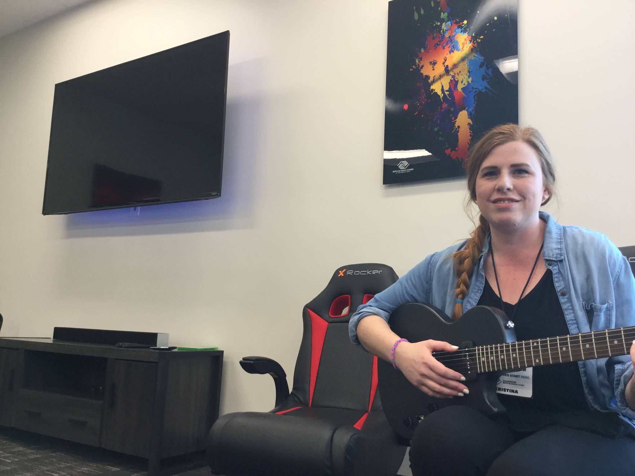 Douglas Buell/Staff Photo                                Arlington Boys and Girls Club Teen Center director Kristina Helland provides a sneak preview of a now-quiet corner of the club&rsquo;s new state-of-the-art teen center set to open May 19.