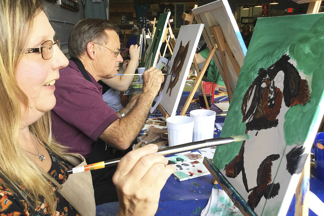 Pet lovers paint portraits of their pooches