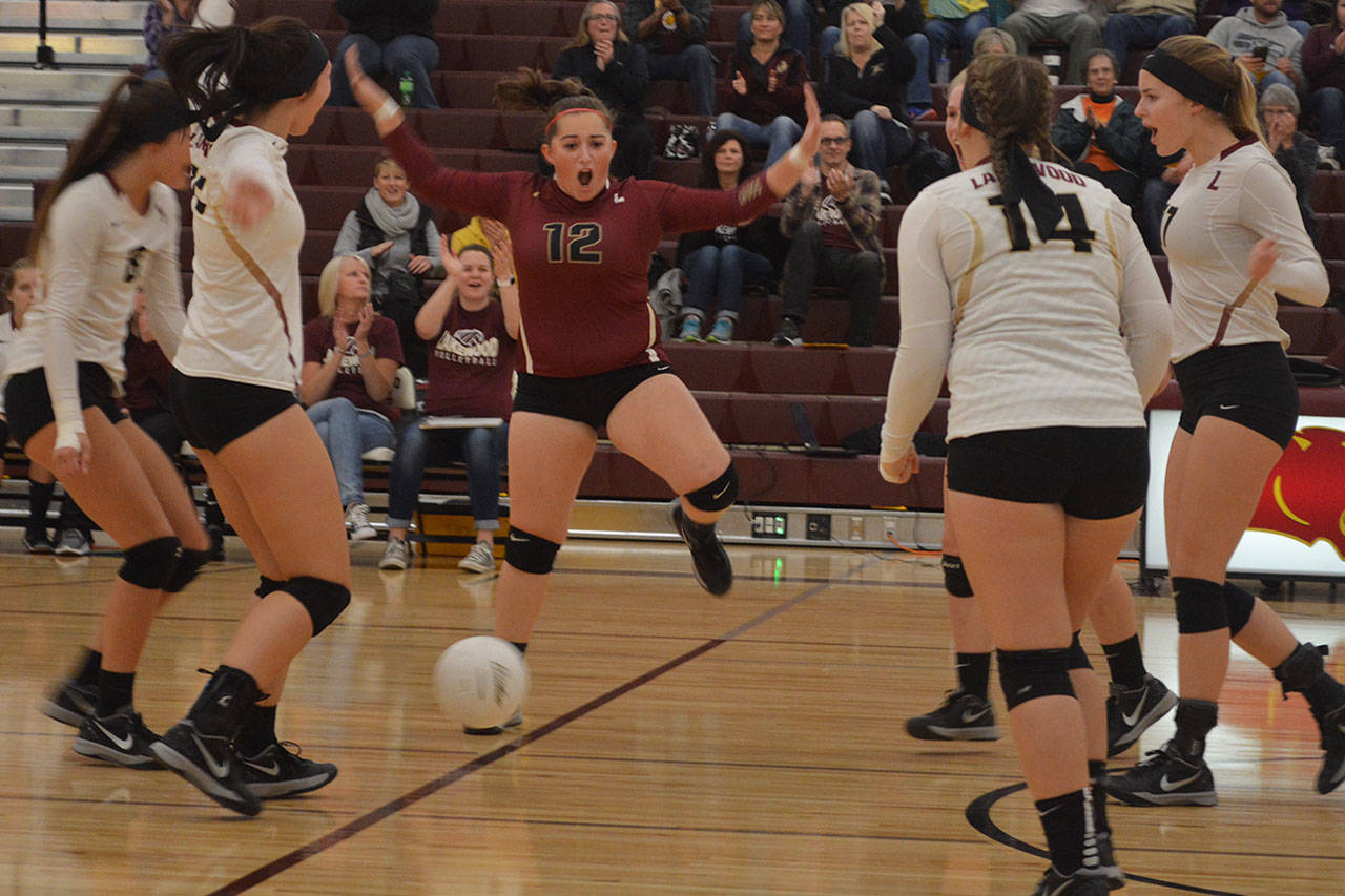 Lakewood wins, Arlington loses in volleyball (slide show)