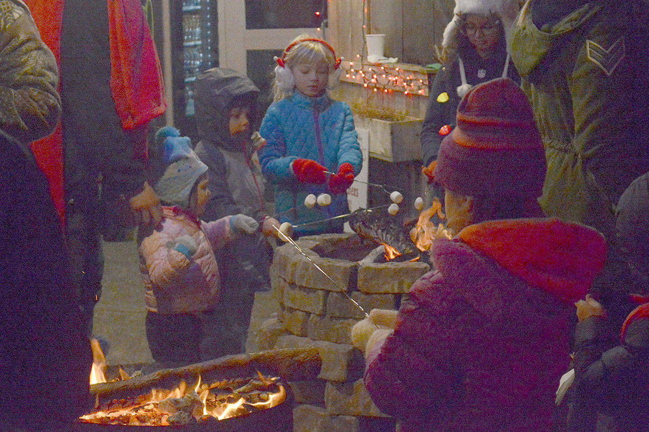 Christmas lights bright on golf course under clear skies (slide show)