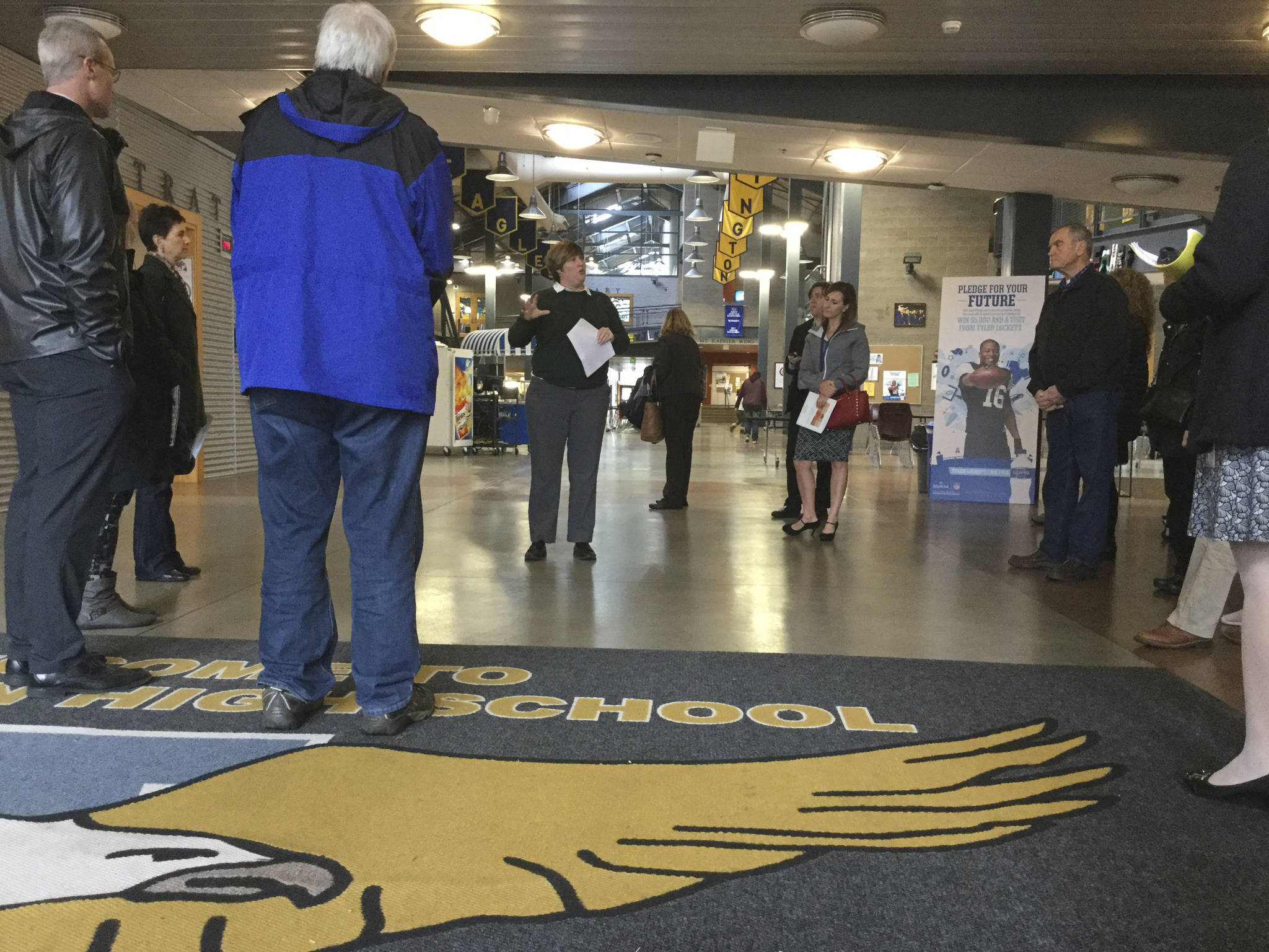 At a tour of Arlington High School, officials talked about security upgrades in the school’s foyer that would be fortified to be more like walking into an airport single-point check-in area. The project was part of the school bond that failed in February.