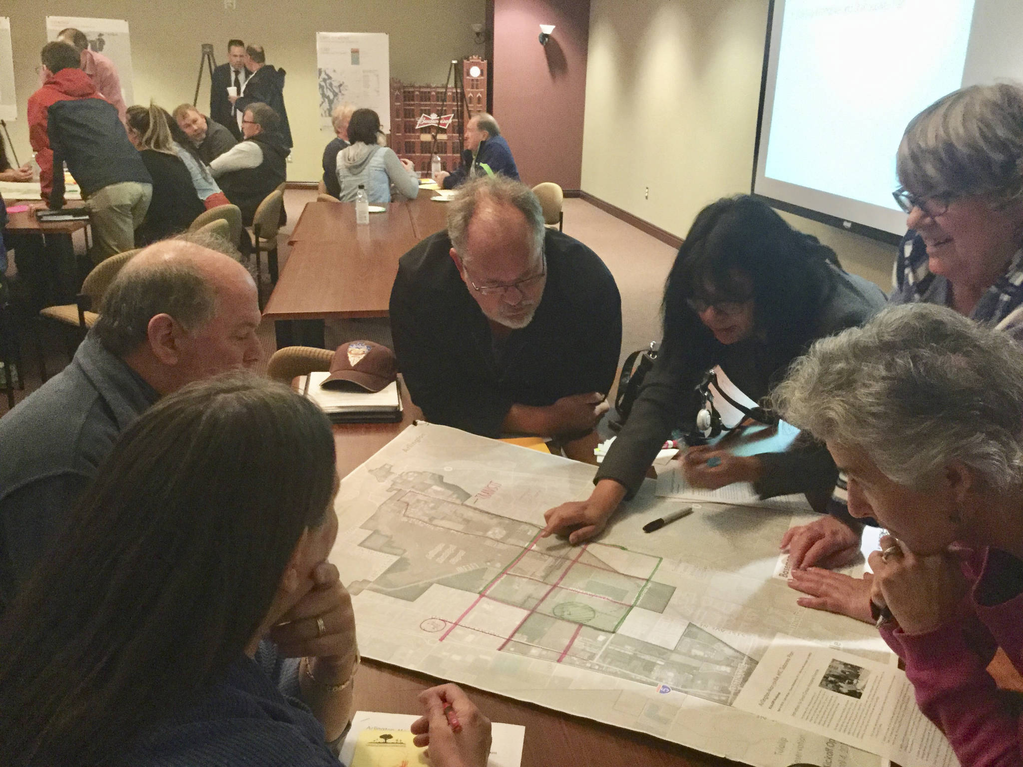 Subarea plan Project Manager Radhika Nair with Berk Consulting guides a discussion on mass transit and bike route infrastructure within the MIC.