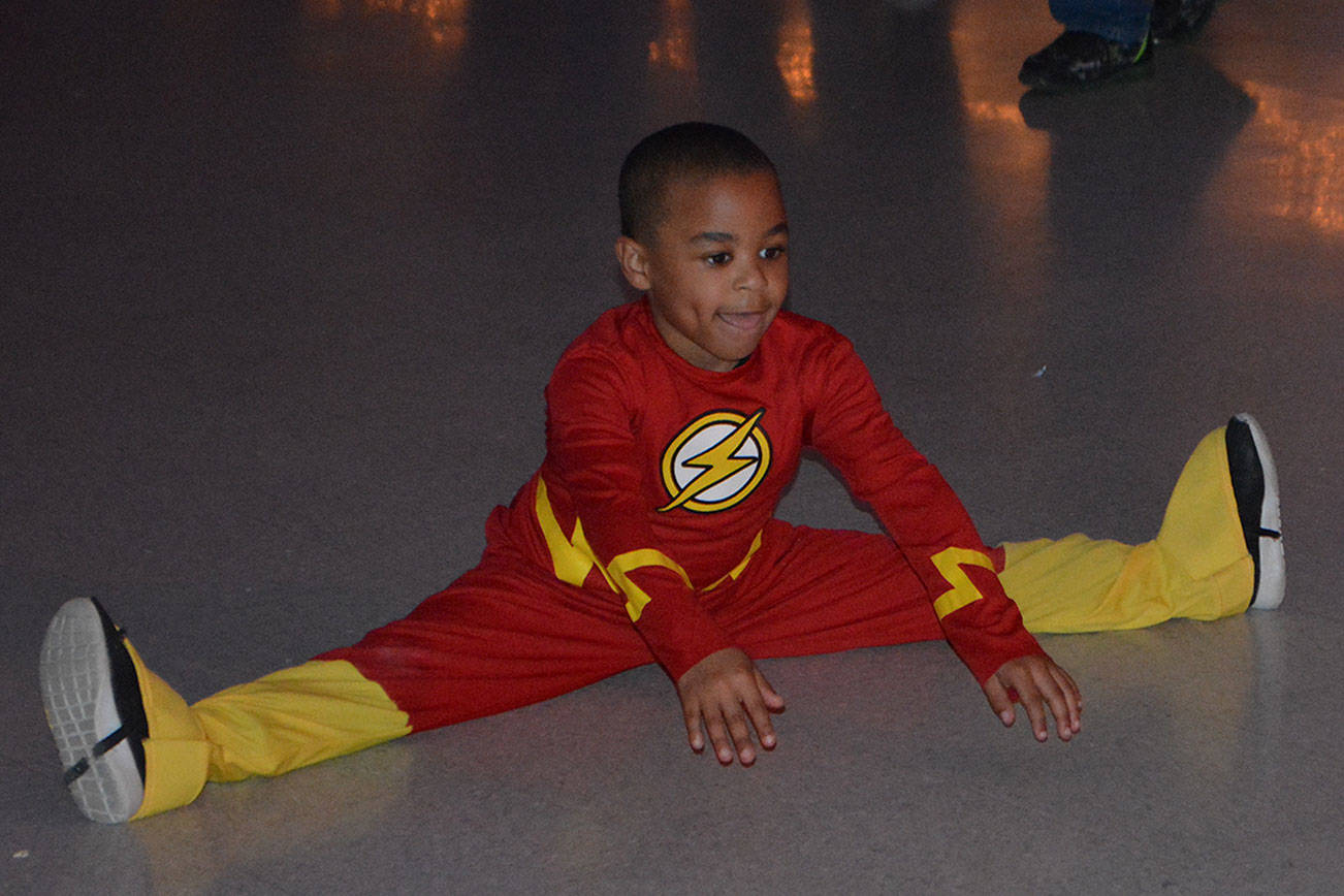 Batmen, Spidermen show moms their dance moves (slide show)