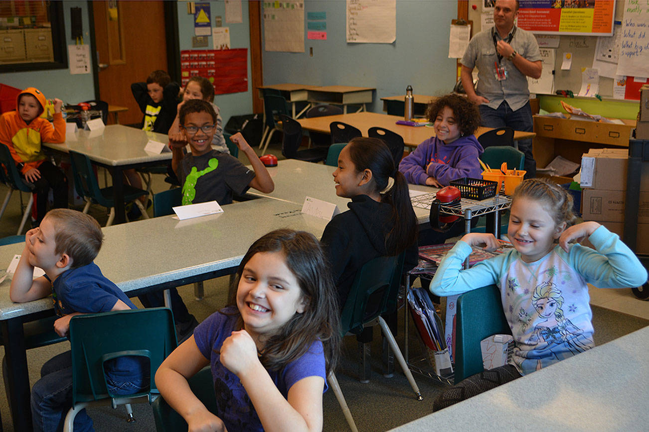 Bankers teach kids about money, money, money, money (slide show)