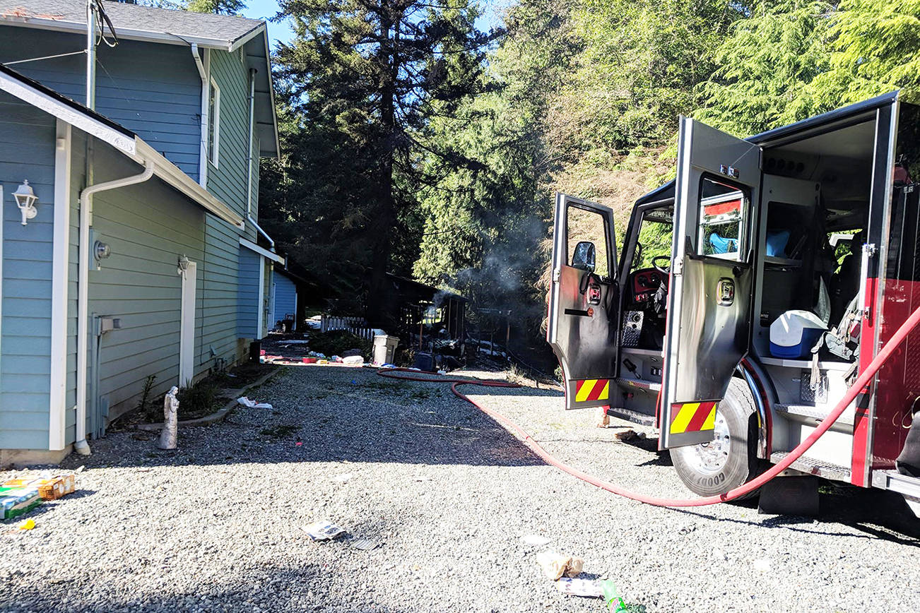 Man found at Arlington house fire with gunshot wound hospitalized