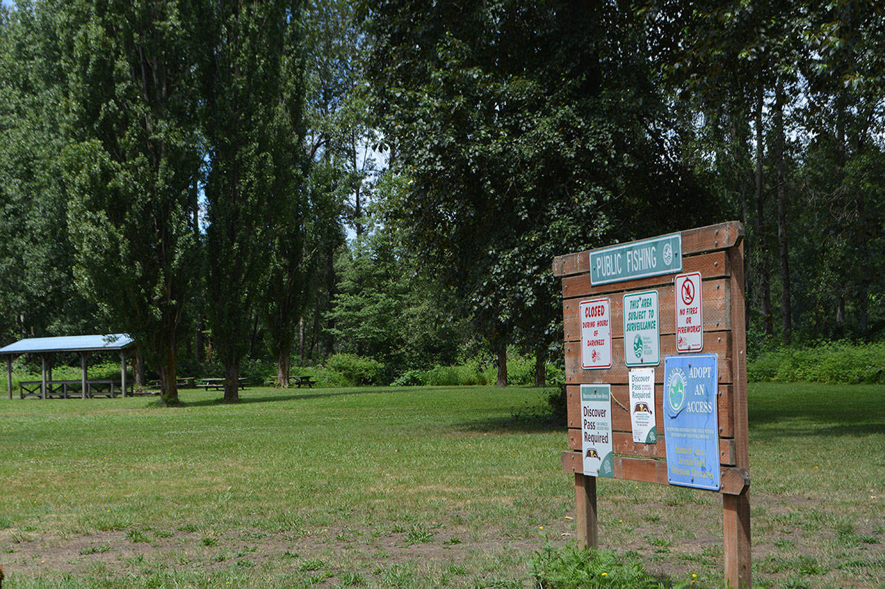 Video leads to arrest of 2 in 2 murders; 1 body found in Arlington park