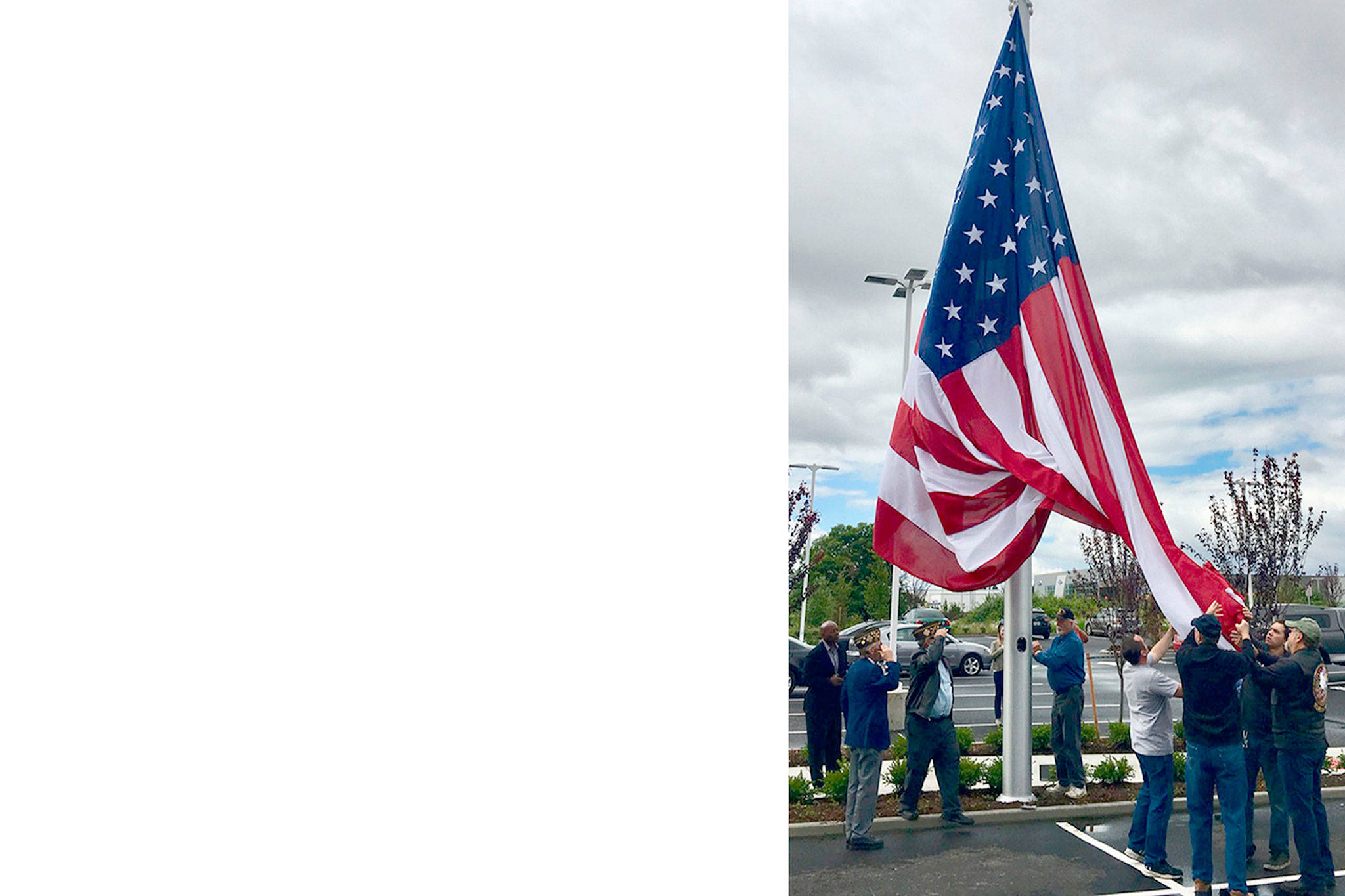 Huge flag flies over new Marysville business