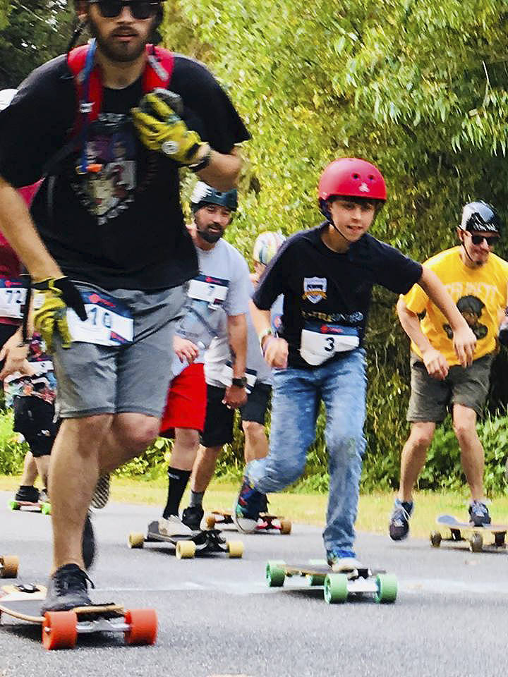 Longboard racing cruises into Arlington for Centennial Sk8 Festival (slide show)