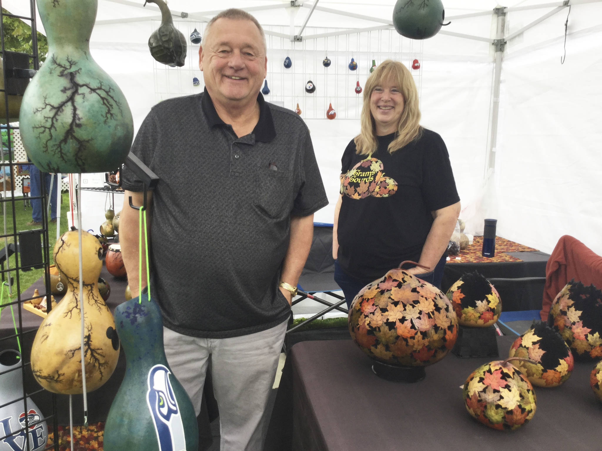 Grams Gourds owner Nancy Wilson and husband, Joe, Marysville, sold their intricate hand-carved gourds at the Art in Legion Park event over the weekend.