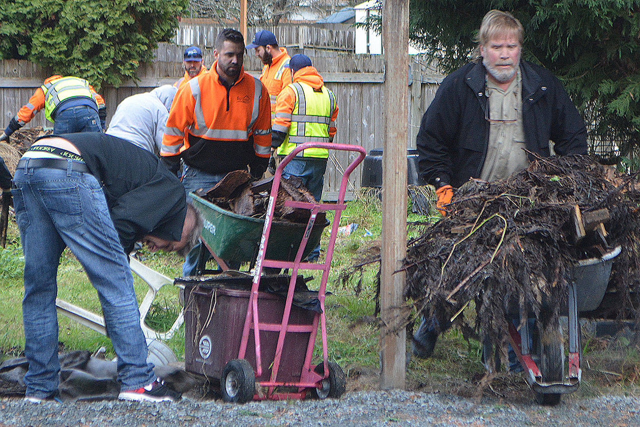 Marysville, church volunteers clean up nuisance property