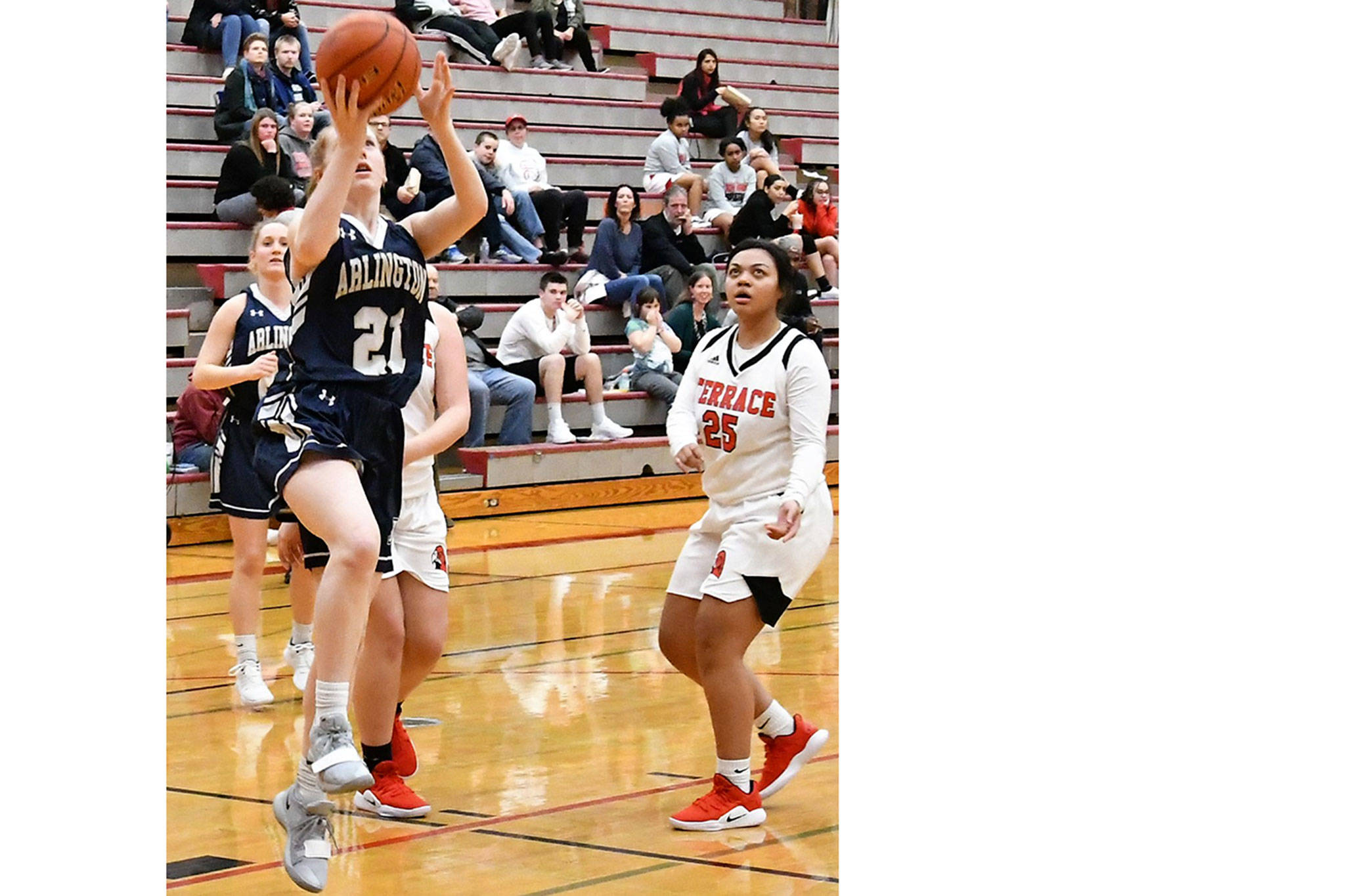 Arlington girls win, boys lose a heart-breaker	(slide show)