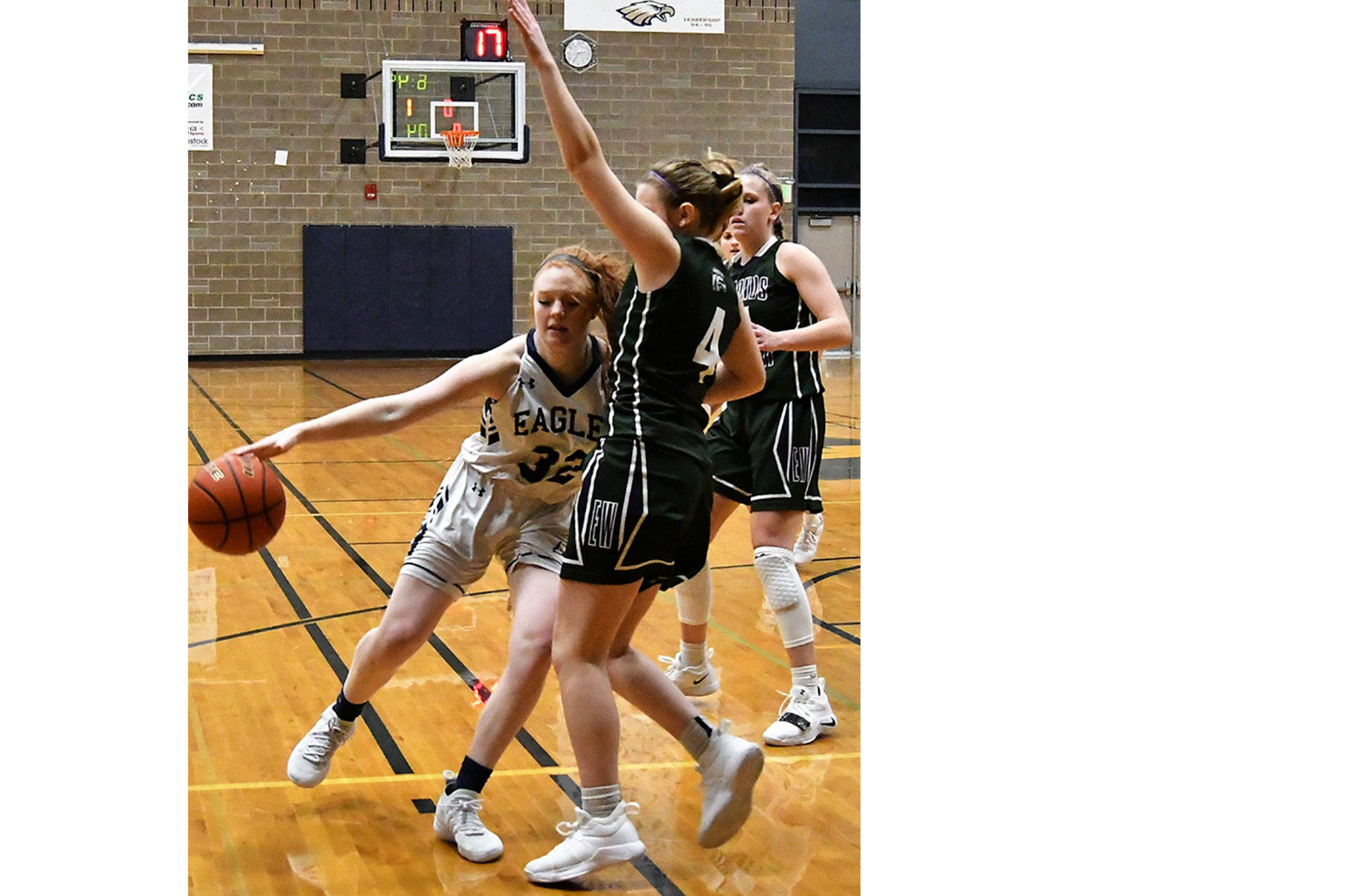 Arlington girls win thriller over E-W; wrestlers also win