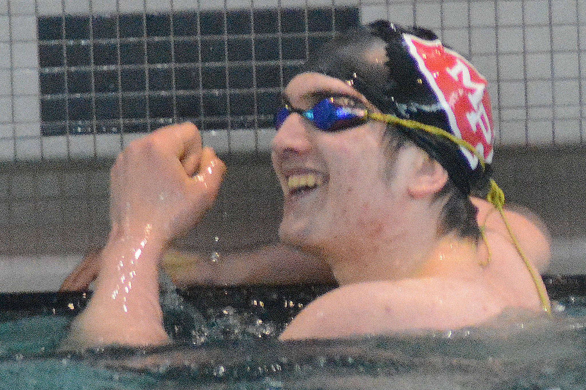 Divers, wrestlers to state; basketball rescheduled (slide show)