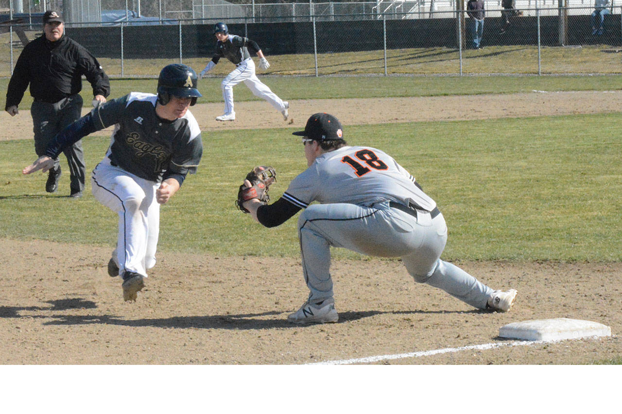 Arlington boys come from behind to beat Monroe in extra innings (slide show)