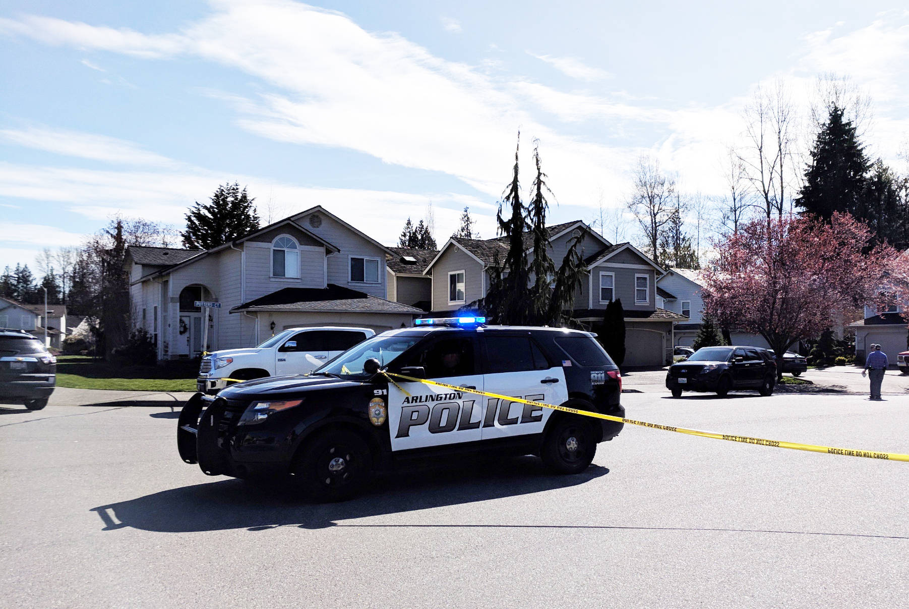 Police cordone off a cul de sac in the Gleneagle neighborhood to investigate possible human remains found in a wooded area.