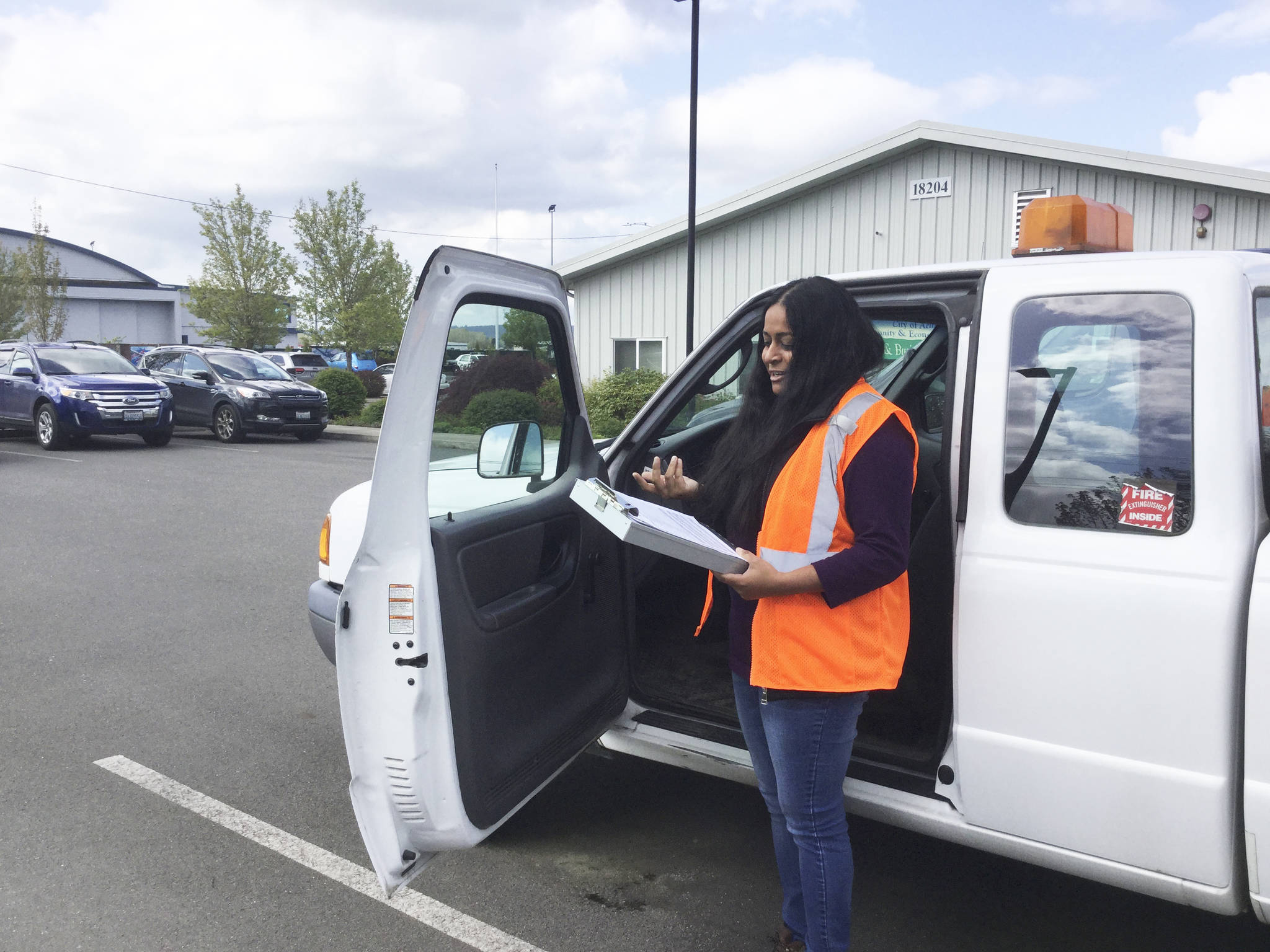 Nalini Margaitis was hired as the city of Arlington’s first full-time code compliance officer. She will follow up on complaints such as junk cars, yard rubbish and other eyesore code violations that give Arlington neighborhoods a black eye.