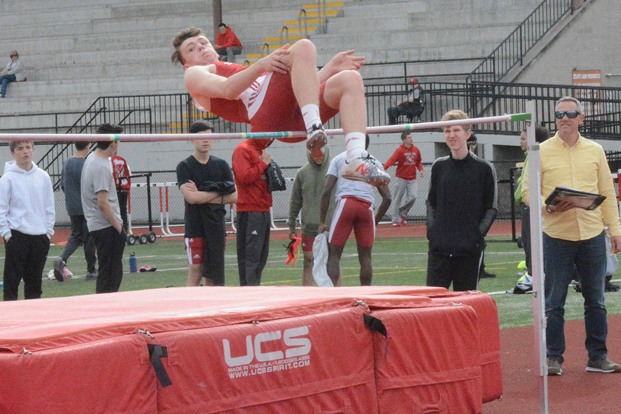 M-P splits in track; Arlington falls; Lakewood softballers edged