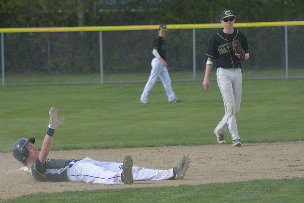 Arlington beats MG; Eagle tracksters take off; girls blank Stanwood; netters edge M-P