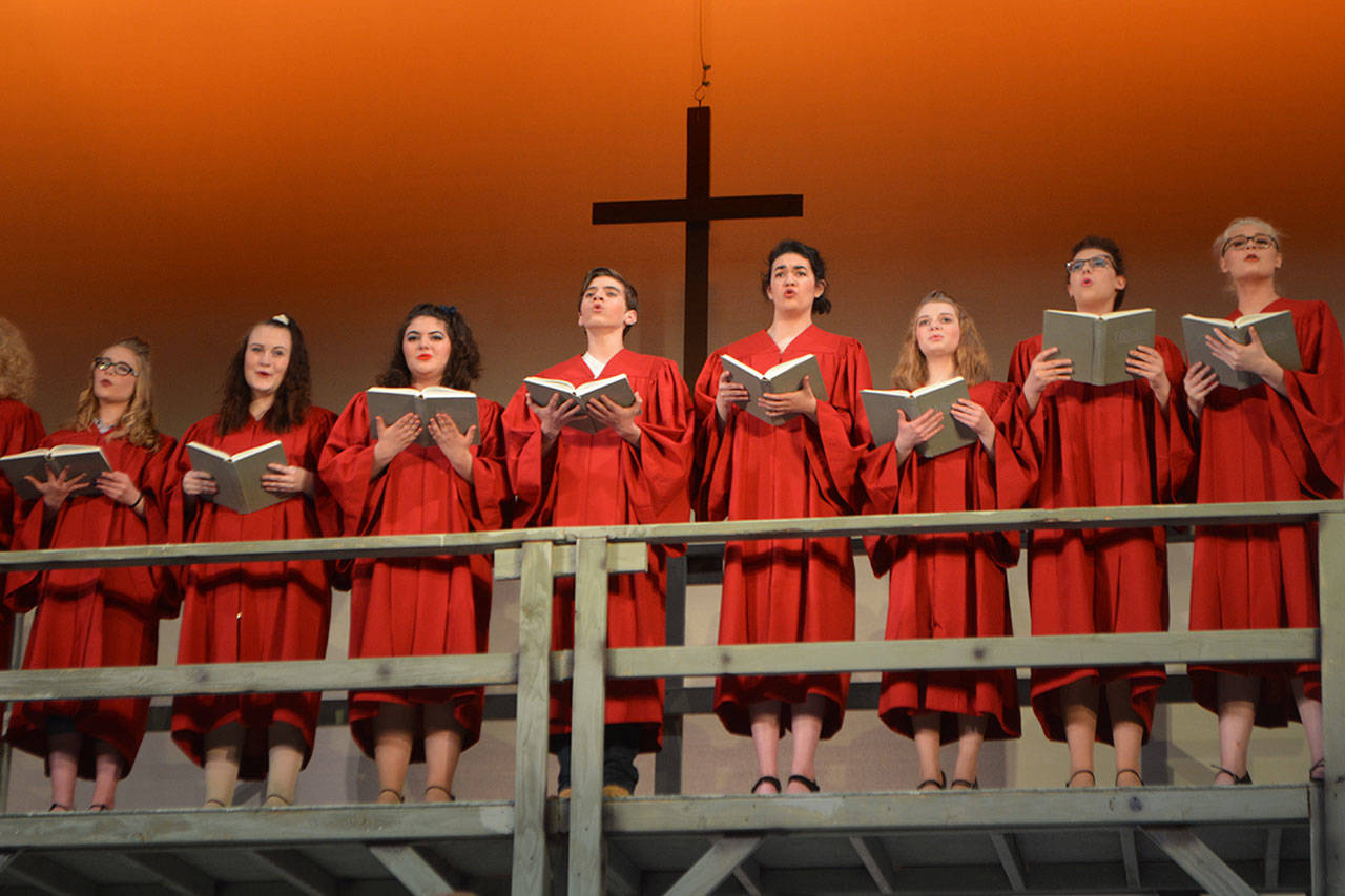 The choir performs at a church service in the ‘Footloose’ musical at Lakewood High.