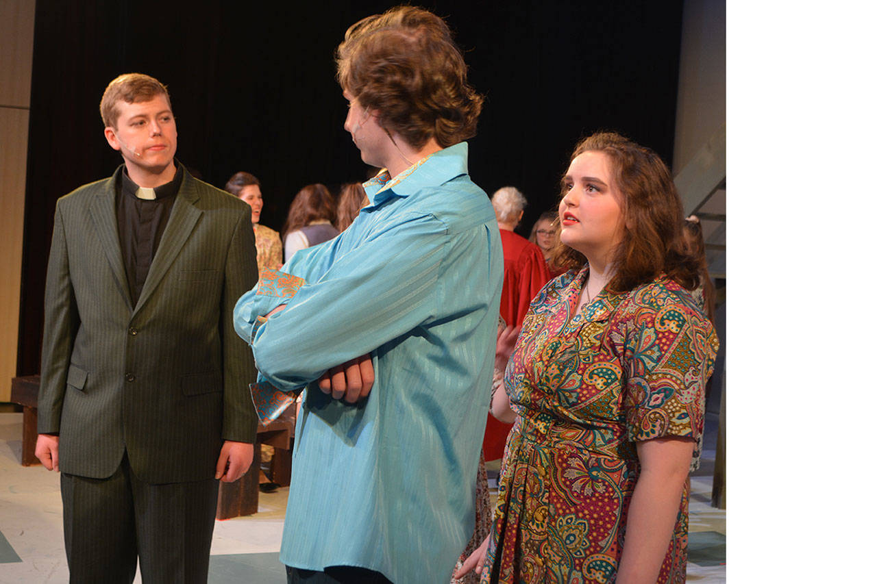 The Rev. Shaw Moore (Sean Peacock) was not impressed by Ren (Kael Bartness), whose mom Ethel (Lauren Hayes) is there for support.