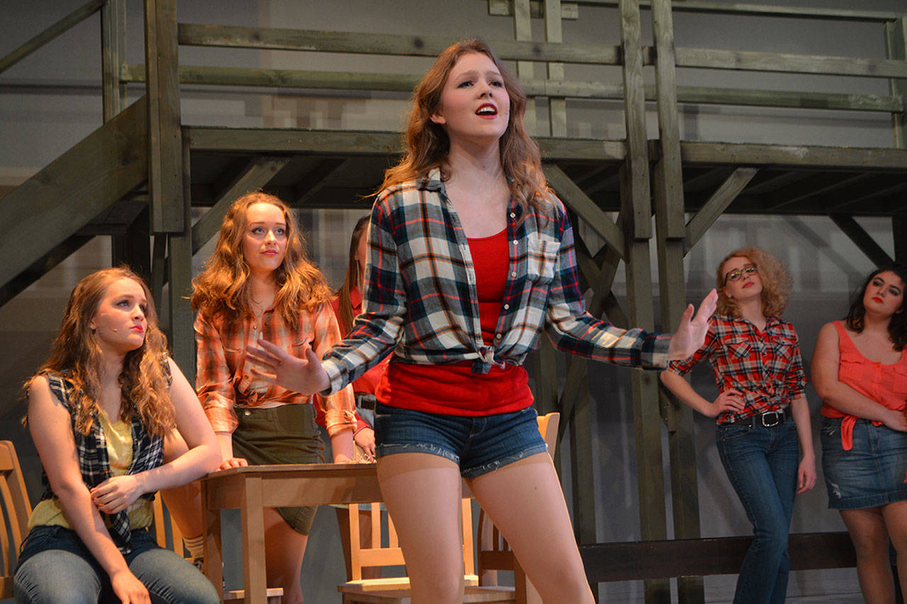 Aerial (Audrey Stich) sings with who friends and the ensemble ‘Let’s Hear it for the Boys.’