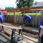 Volunteers build ramps for those in need