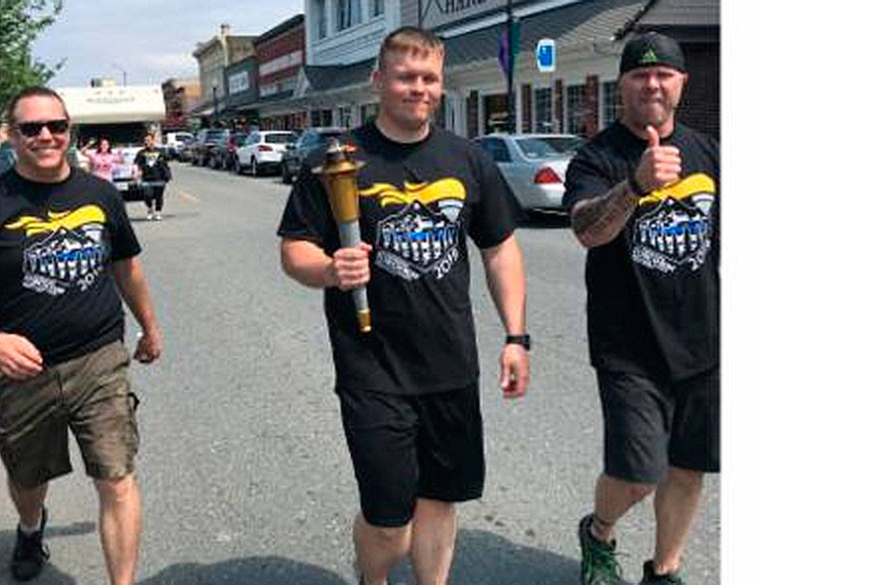 Arlington police part of torch run to help Special Olympics