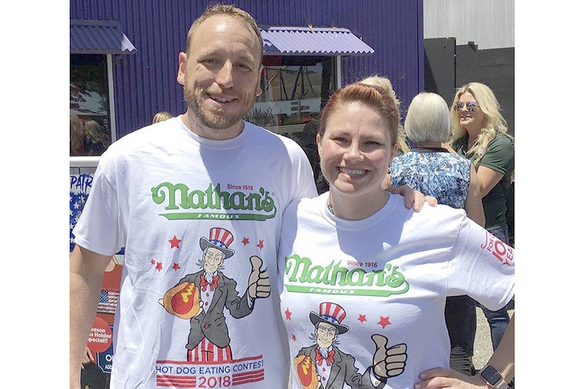 Katie Prettyman of Marysville with men’s champion Joey Chestnut. (Courtesy Photo)