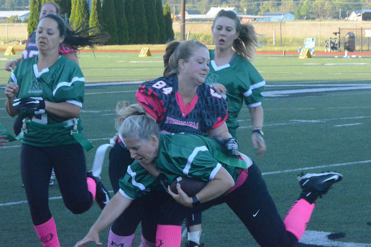 Moms raise money for Marysville youth football by playing the game themselves (slide show)