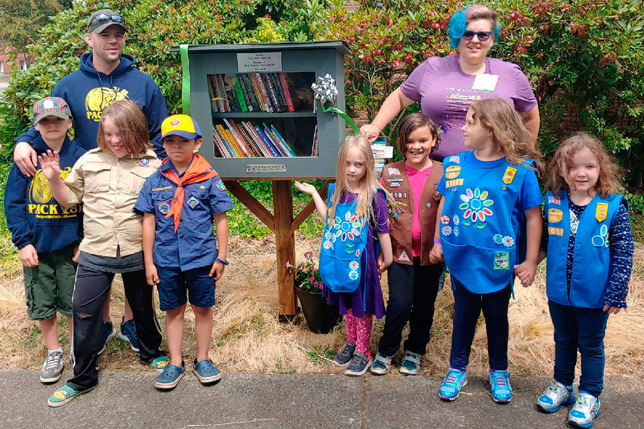 Youth groups build free library near church on 4th in Marysville