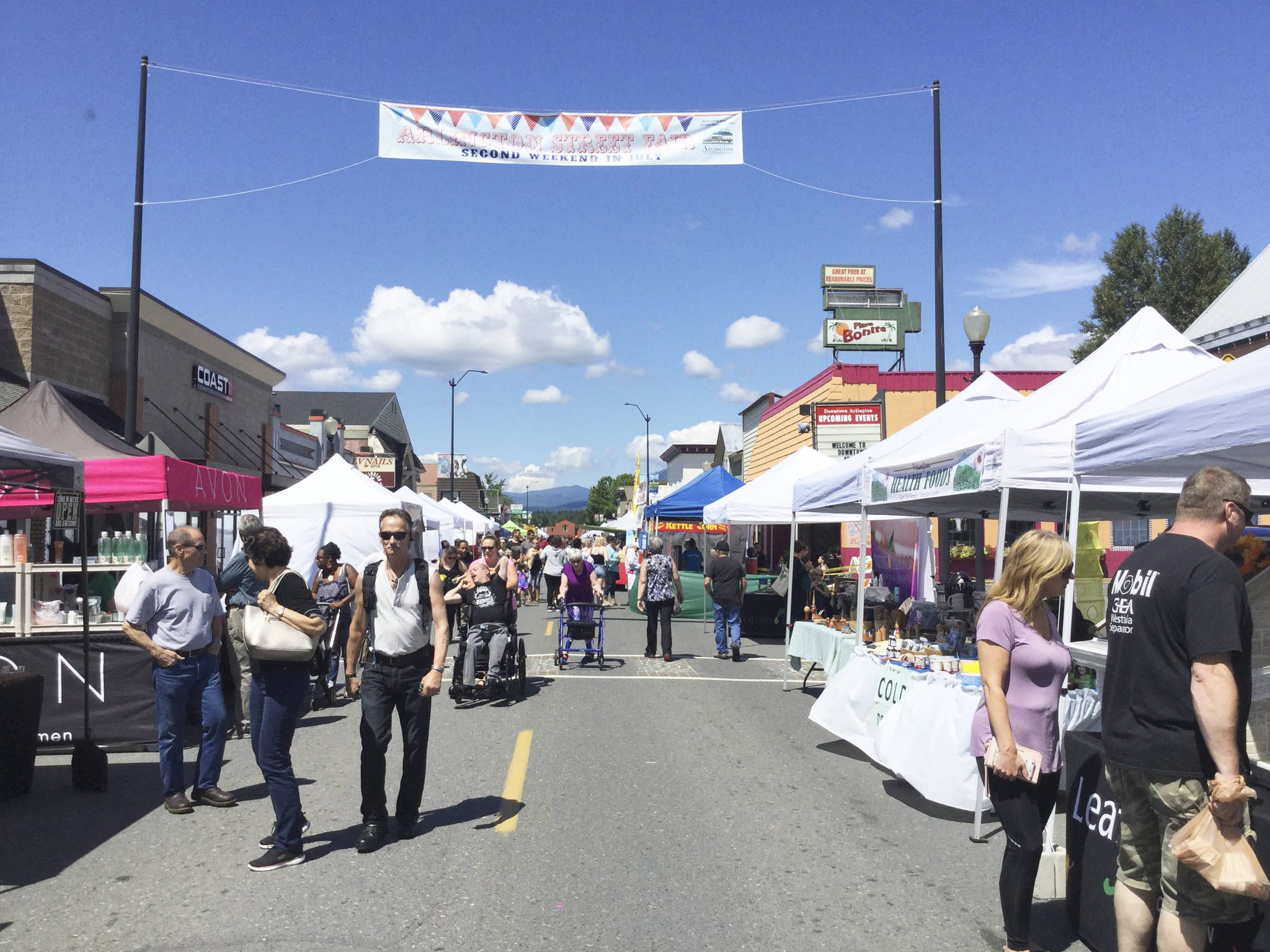 Shoppers made their was down Olympic Avenue downtown during the Arlington Street Fair last weekend.