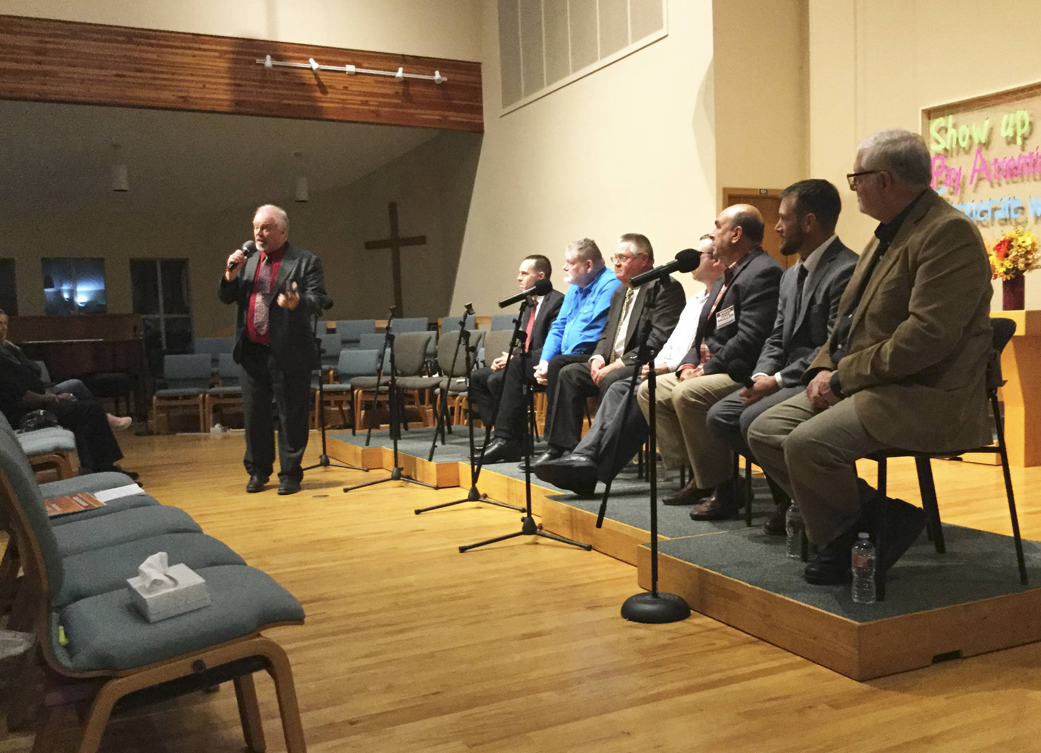 Managing Editor Steve Powell moderates a candidates forum hosted by The Marysville Globe Tuesday at Marysville United Methodist Church. Seated from left, incumbent Mayor Jon Nehring and challenger Mike Patrick; City Council Pos. 5 candidates Kelly Richards and Jeff Seibert; City Councilman Steve Muller; and school board candidates in separate races, Paul Galovin and incumbent Tom Albright.