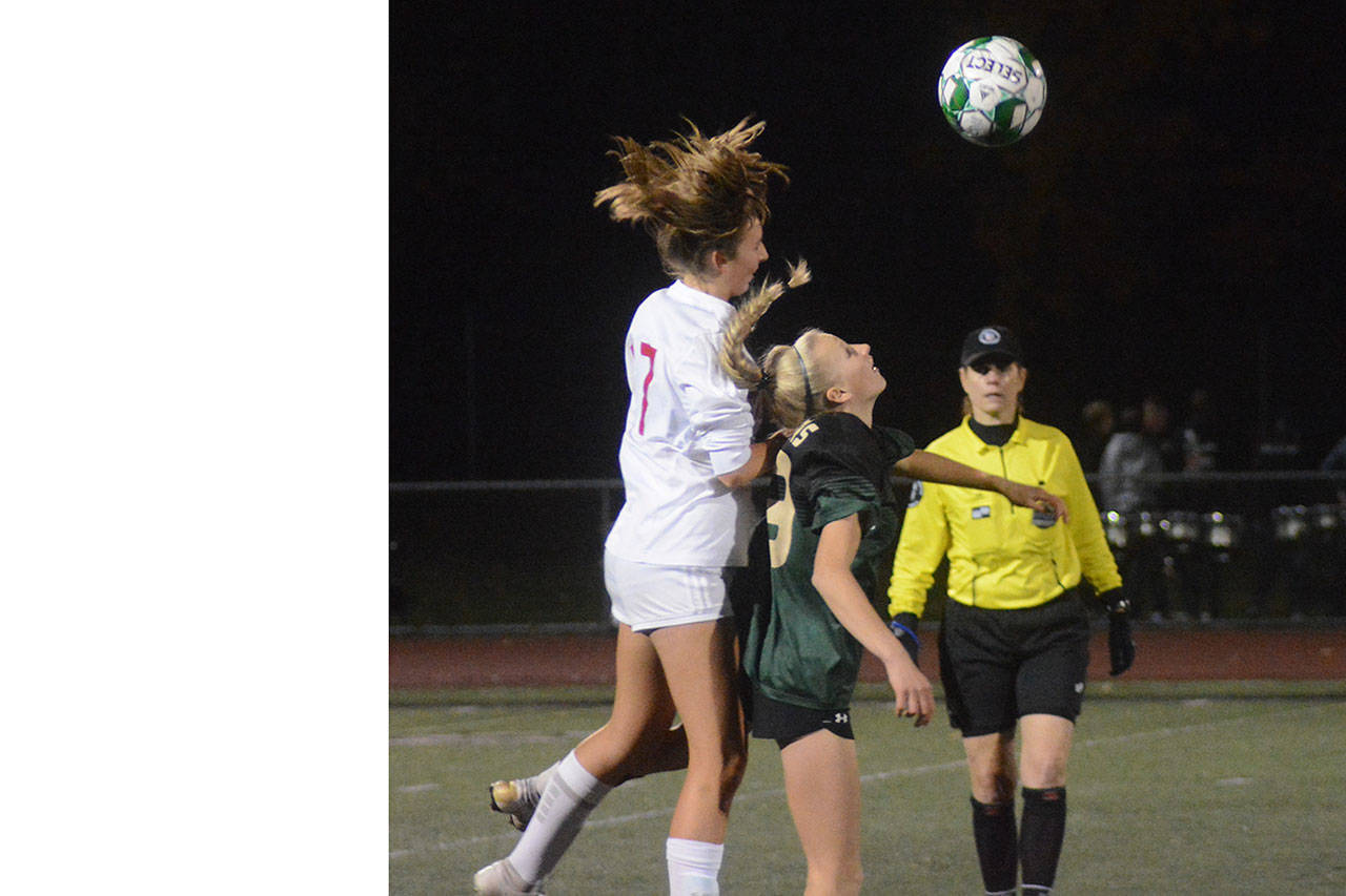Steve Powell/Staff Photos                                 Meaghan Connelly of M-P and Kirsten Crane go for the ball.