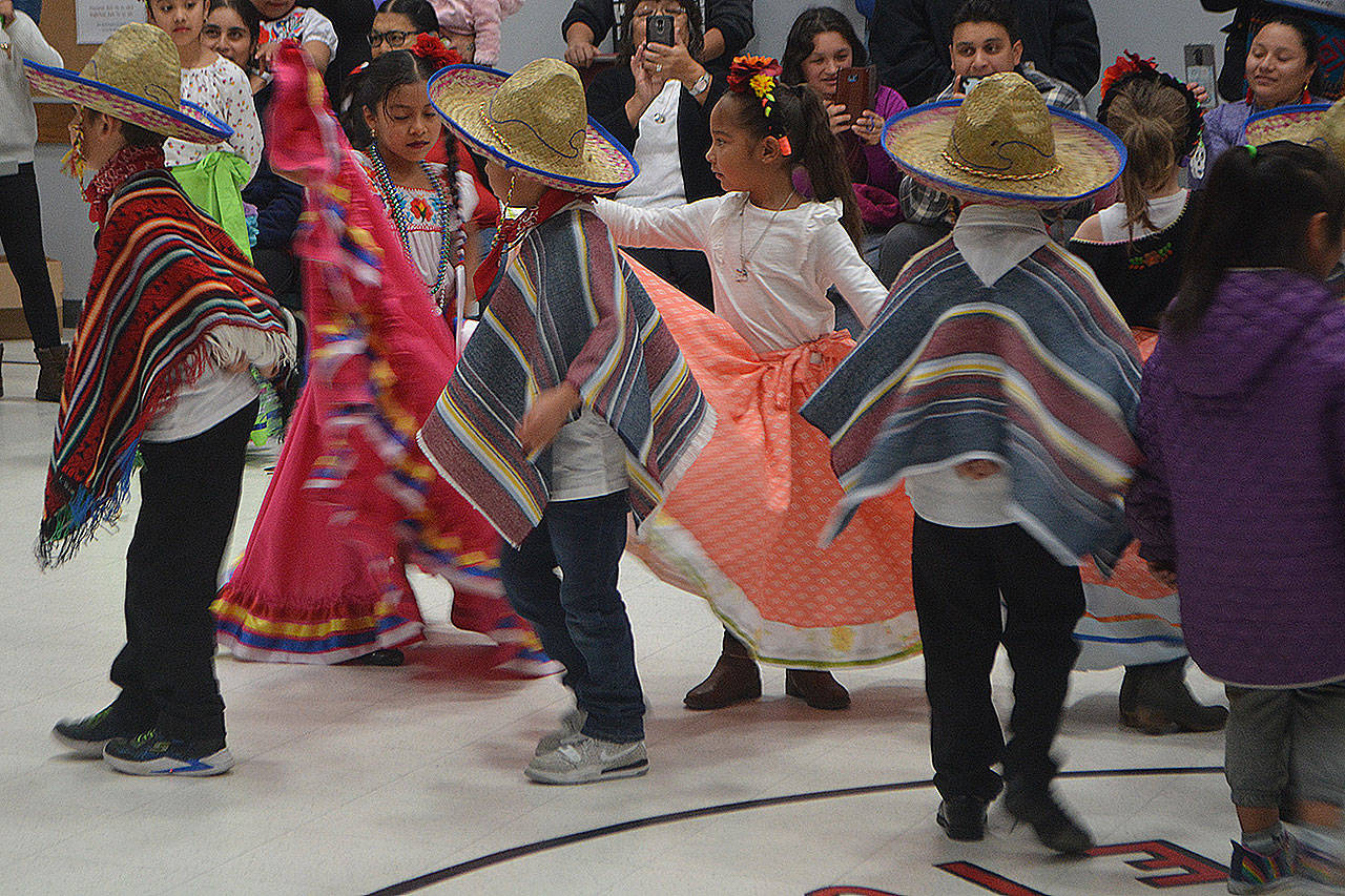 Students in first-grade teacher Xochitl Palacios’ class dance. (Steve Powell/Staff Photos)