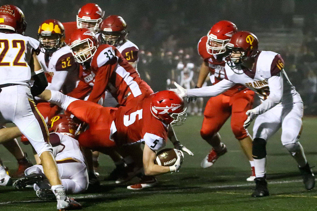 Dylan Carson of M-P scores the winning touchdown against Prairie. (Kevin Clark/The Herald)