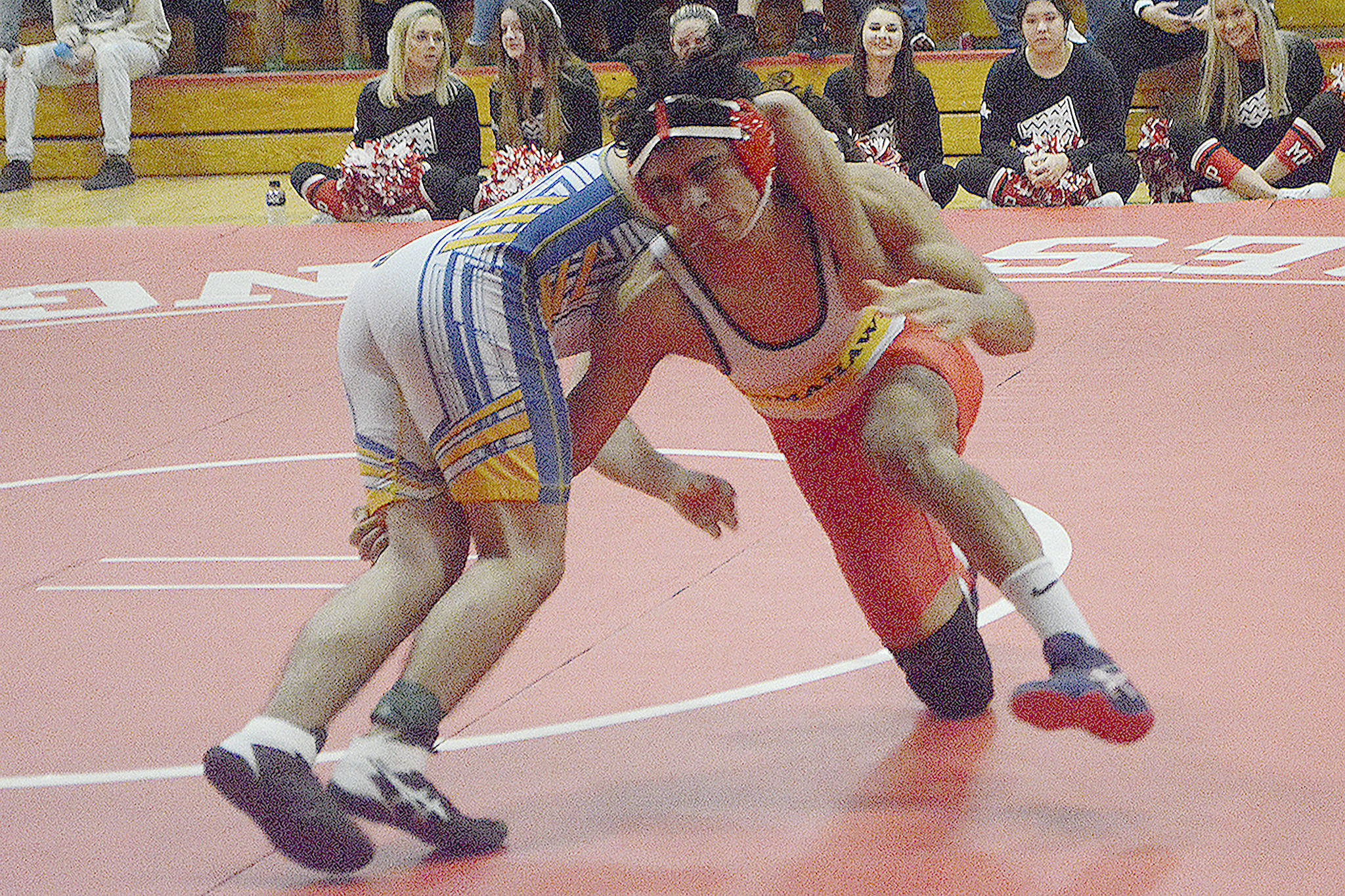 M-P wrestlers win big; MG girls fall but Arlington wins easily; Coug boys win by 3