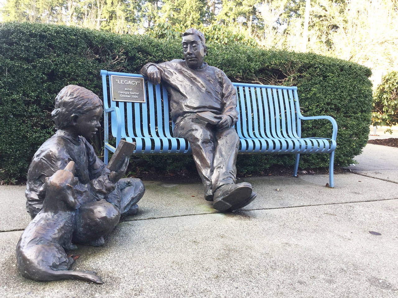 “Legacy” bronze sculpture at the Marysville Sno-Isle Public Library.