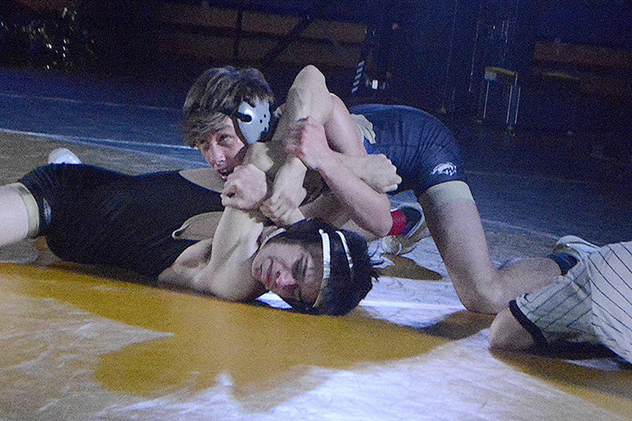 Arlington edges MG in wrestling