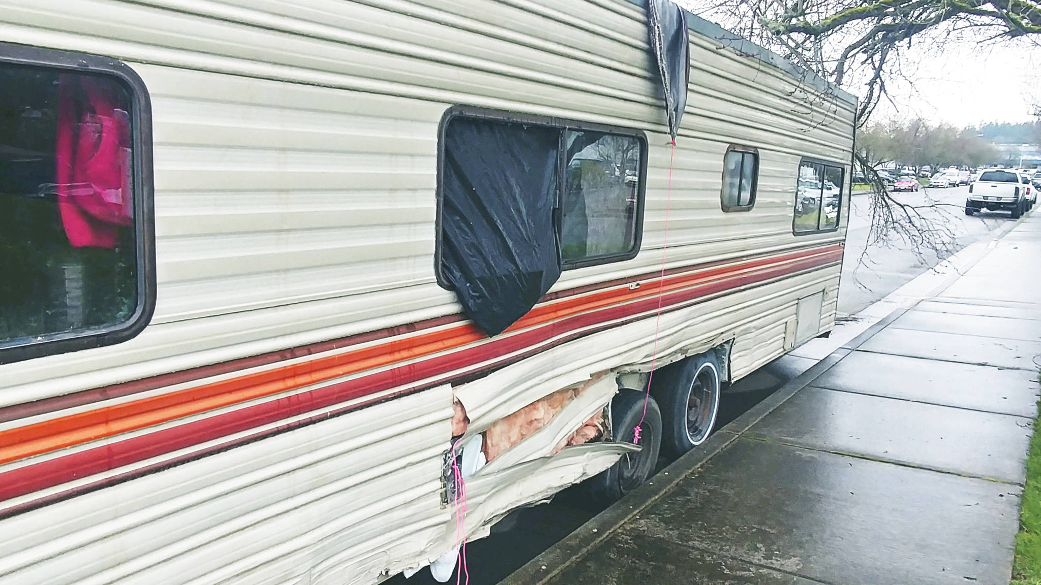 An abandoned trailer illegally parked creates an eyesore for one Arlington neighborhood.