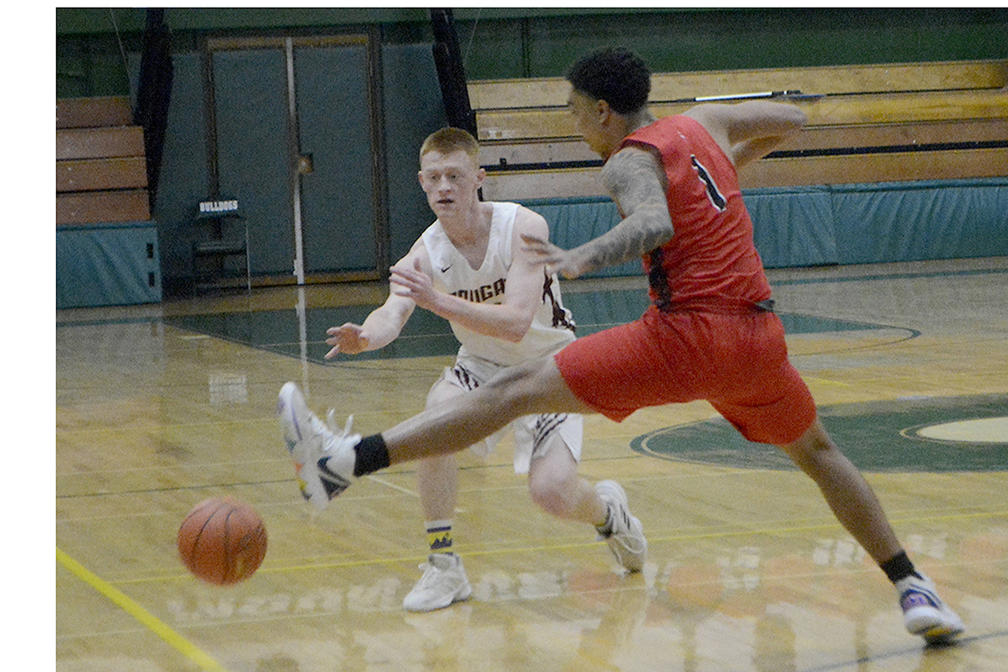 Alex Jensen tosses a bounce pass.