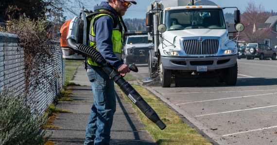 Crews will blow garbage into the street and sweep it up over the next few weeks. The city is asking people to move their cars, trash cans and recycle bins when they come around to help them do a thorough job. (Courtesy Photo)