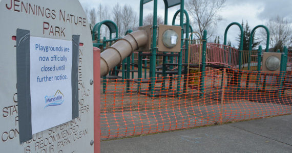 Fences have been put up around Marysville playgrounds to keep kids off. (Steve Powell/Staff Photos)