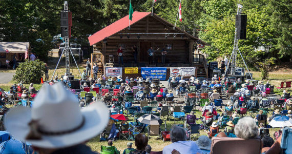 Hundred gather at the 2018 Darrington Bluegrass Festival on Saturday, July 21, 2018 in Darrington, Wa. (Olivia Vanni / The Herald)